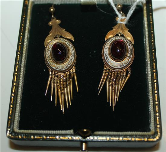 Pair 19C Etruscan Revival yellow metal and white enamel drop earrings inset cabochon garnets (one a.f)